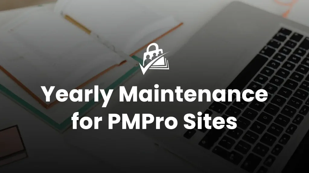Banner image for the Essential Yearly Maintenance for Your Paid Memberships Pro Site blog post — bold white headline reading "Yearly Maintenance for PMPro Sites" centered over a photo of an open planner notebook beside a laptop keyboard
