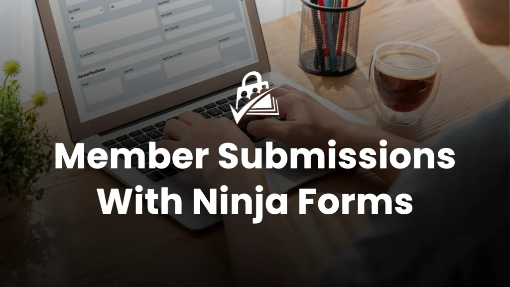 Banner image for the Member Submissions With Ninja Forms blog post — bold white headline reading "Member Submissions With Ninja Forms" centered over a photo of hands typing on a laptop displaying a form, with a coffee cup and pencil holder on the desk