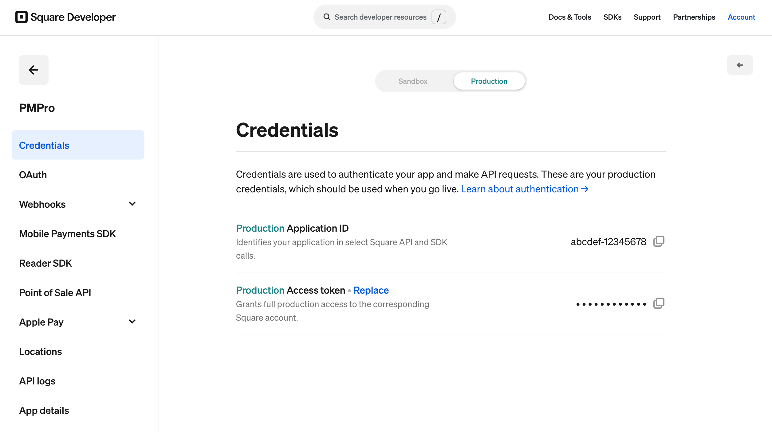 The Square Developer Dashboard Credentials page on the Production tab, showing the Production Application ID and Production Access token for the PMPro application