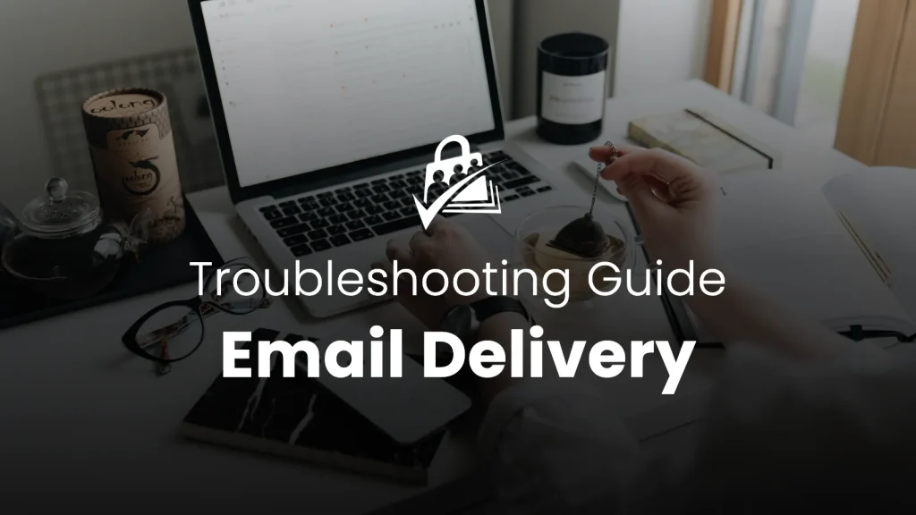 Troubleshooting Email Delivery on Your Membership Site — a person at a cozy home office desk with laptop and tea