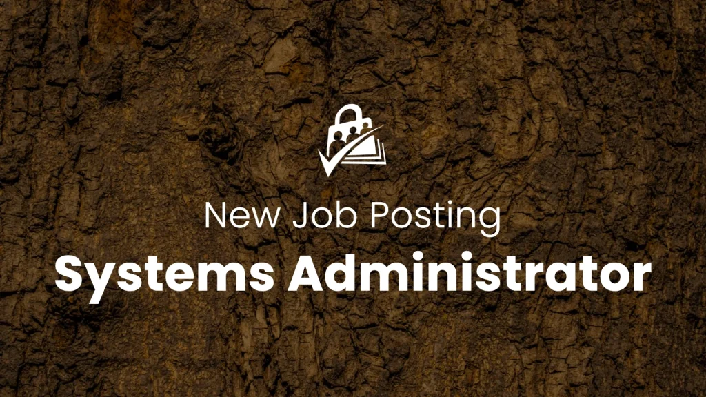 Banner image for the We're Hiring a Sysadmin for Our Hosting Platform blog post. White Paid Memberships Pro icon with the text "New Job Posting Systems Administrator" over a dark tree-bark texture background.